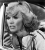 Connie Stevens Looking Away in Printed Jacket with Circle Earrings Photo Print - Item # VARCEL706962