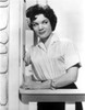 Connie Francis Leaning on Wall, wearing White Dress Photo Print - Item # VARCEL707108