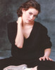 Ally Sheedy sitting on the Floor wearing Black Shirt and a Pair of Sneakers in Portrait Photo Print - Item # VARCEL707079