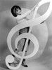 Connie Francis Posed in Elegant Dress while Holding a Gclef Note Photo Print - Item # VARCEL707120