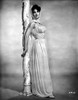 Suzanne Pleshette wearing a Silk Gown and Leaning on Post Photo Print - Item # VARCEL707169