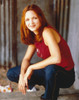 Jordana Spiro sitting Pose in Red Sleeveless Shirt and Denim Pants Portrait Photo Print - Item # VARCEL707416