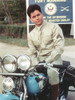 John Stamos Posed in Motorcycle Portrait Photo Print - Item # VARCEL707454