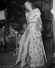 Barbara Stanwyck sitting in Bath Robe Classic Portrait Photo Print - Item # VARCEL707617