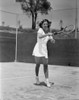 Barbara Stanwyck Playing Tennis in White Dress in Classic Portrait Photo Print - Item # VARCEL707623