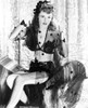 Barbara Stanwyck sitting in See-Through Dress Classic Portrait Photo Print - Item # VARCEL707625