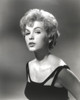 Stella Stevens Posed in Black and White Portrait wearing Sexy Black Dress Photo Print - Item # VARCEL707795