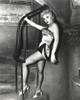 Stella Stevens Posed on Stairs wearing Silk Lace Lingerie in Black and White Photo Print - Item # VARCEL707865
