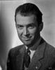 James Stewart Portrait in Black Silk Printed Necktie and White Cotton Collar Shirt with Linen Sport Coat in White Background Photo Print - Item # VARCEL707912