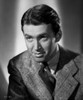 James Stewart Posed in Grey Corduroy Suit and Black Silk Necktie with Eyes Looking Up Photo Print - Item # VARCEL707885