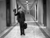 James Stewart Posed in Black Suit and Necktie with Right Hand Holding a Black Bowler Hat Photo Print - Item # VARCEL707944