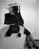 Gloria Swanson sitting in Side View Classic Portrait Photo Print - Item # VARCEL708161