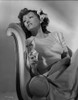 Gloria Swanson sitting in Classic Portrait Photo Print - Item # VARCEL708212
