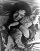 Sigourney Weaver Carrying Cat in Classic Photo Print - Item # VARCEL708331