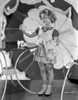 Shirley Temple Holding a Shoe in White Dress Photo Print - Item # VARCEL708436