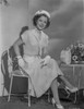 Shirley Temple sitting on a Chair and wearing a Wrap Dress Photo Print - Item # VARCEL708466