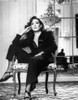 Anjelica Huston Seated in Classic Photo Print - Item # VARCEL708499