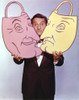 Danny Thomas standing in Black Tuxedo Holding Two Faces Photo Print - Item # VARCEL708782