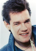 Randy Travis smiling in Close Up Portrait wearing Blue Denim Jacket Photo Print - Item # VARCEL708937