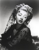 Lana Turner posed in Embroider Black Dress Photo Print - Item # VARCEL709036