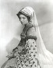 Black and White Portrait of Lana Turner sitting in Old Irish Dress Photo Print - Item # VARCEL709017