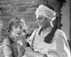Rudolph Valentino Portrait in White Arabic Costume Photo Print - Item # VARCEL709107