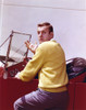 Jerry Van Dyke Posed in Yellow Knitted Coat and Grey Linen Pants Photo Print - Item # VARCEL709126