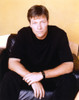 Jack Wagner sitting on a Couch in Black Shirt Photo Print - Item # VARCEL709152
