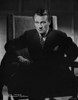 John Wayne sitting in suit and tie Photo Print - Item # VARCEL709209