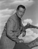 John Wayne portrait in suit coat Portrait in Black and White Photo Print - Item # VARCEL709260
