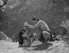 Johnny Weissmuller Hanging Up with His Monkey in a Classic Movie Scene Photo Print - Item # VARCEL709302