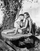 Johnny Weissmuller Making a Love Scene with a Woman in a Classic Movie Scene Photo Print - Item # VARCEL709308