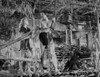Johnny Weissmuller Saying Goodbye to a Woman Before Riding a Rope Swing in a Classic Movie Scene Photo Print - Item # VARCEL709342