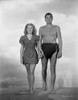 Johnny Weissmuller Taking a Picture with a Woman while Holding Hands in a Classic Movie Scene Photo Print - Item # VARCEL709412