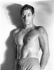 Johnny Weissmuller standing in a Portrait Photo Print - Item # VARCEL709434