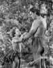 Johnny Weissmuller Having a Conversation with a Kid in a Movie Scene Photo Print - Item # VARCEL709441