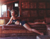Tuesday Weld Lying on Brown Couch Photo Print - Item # VARCEL709500