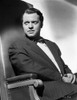 Orson Welles Seated in Coat and Bowtie Photo Print - Item # VARCEL709541