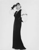 Mae West standing in Black Dress with White Background Photo Print - Item # VARCEL709615