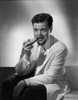 Orson Welles Smoking in Black and White Photo Print - Item # VARCEL709558