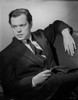 Orson Welles Reclining in Coat and Tie Photo Print - Item # VARCEL709570