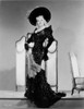 Mae West Posed in Black Glossy Dress with Black Hat Photo Print - Item # VARCEL709666