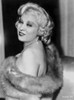 Mae West Posed Sideways in Fur Coat with a Little Smile Photo Print - Item # VARCEL709668