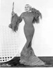 Mae West standing in Classic Long Gown Photo Print - Item # VARCEL709617
