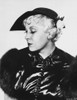 Mae West Looking Down in Glossy Black Dress with Fur Sleeves Photo Print - Item # VARCEL709626