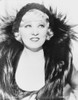 Mae West smiling in Feather Dress with Black Headband Photo Print - Item # VARCEL709648