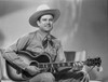 A portrait of Ray Whitley Photo Print