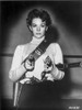 Natalie Wood Holding Two Guns Photo Print - Item # VARCEL709984