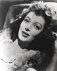 Loretta Young Portrait Lying with Curly Hair Photo Print - Item # VARCEL710022