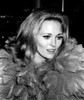 Faye Dunaway wearing feathers Photo Print - Item # VARGLP355889